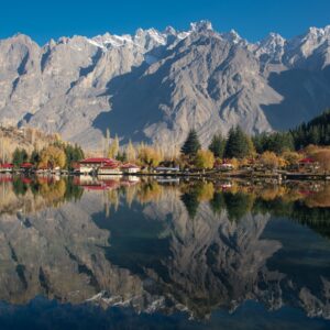 Beautiful reflection of mountains and autumn foliage at Shangrila Lake, Skardu, Pakistan.