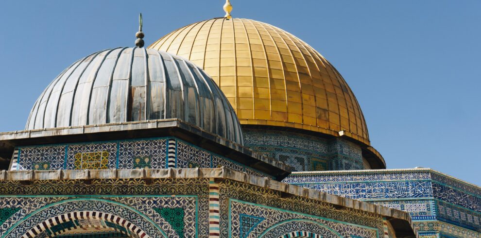 Brightly detailed capture of the iconic Dome of the Rock in Jerusalem, showcasing intricate Islamic architecture.