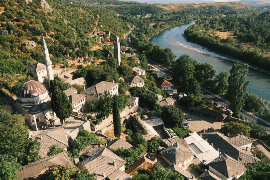 Explore the scenic beauty of Počitelj village with its Ottoman architecture and the winding Neretva River.